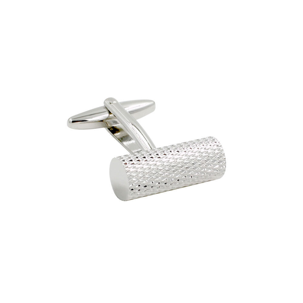 A Cylinder Cufflink with a polished finish and textured pattern.