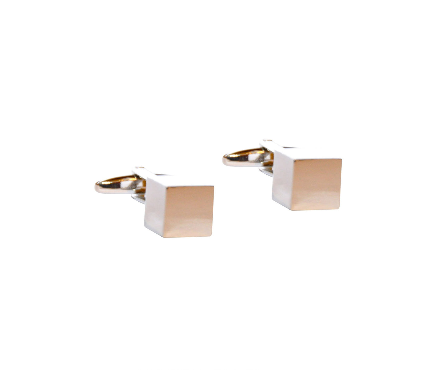 The Cubed Cufflinks showcase a sleek geometric design against a white backdrop, ideal for the modern gentleman.