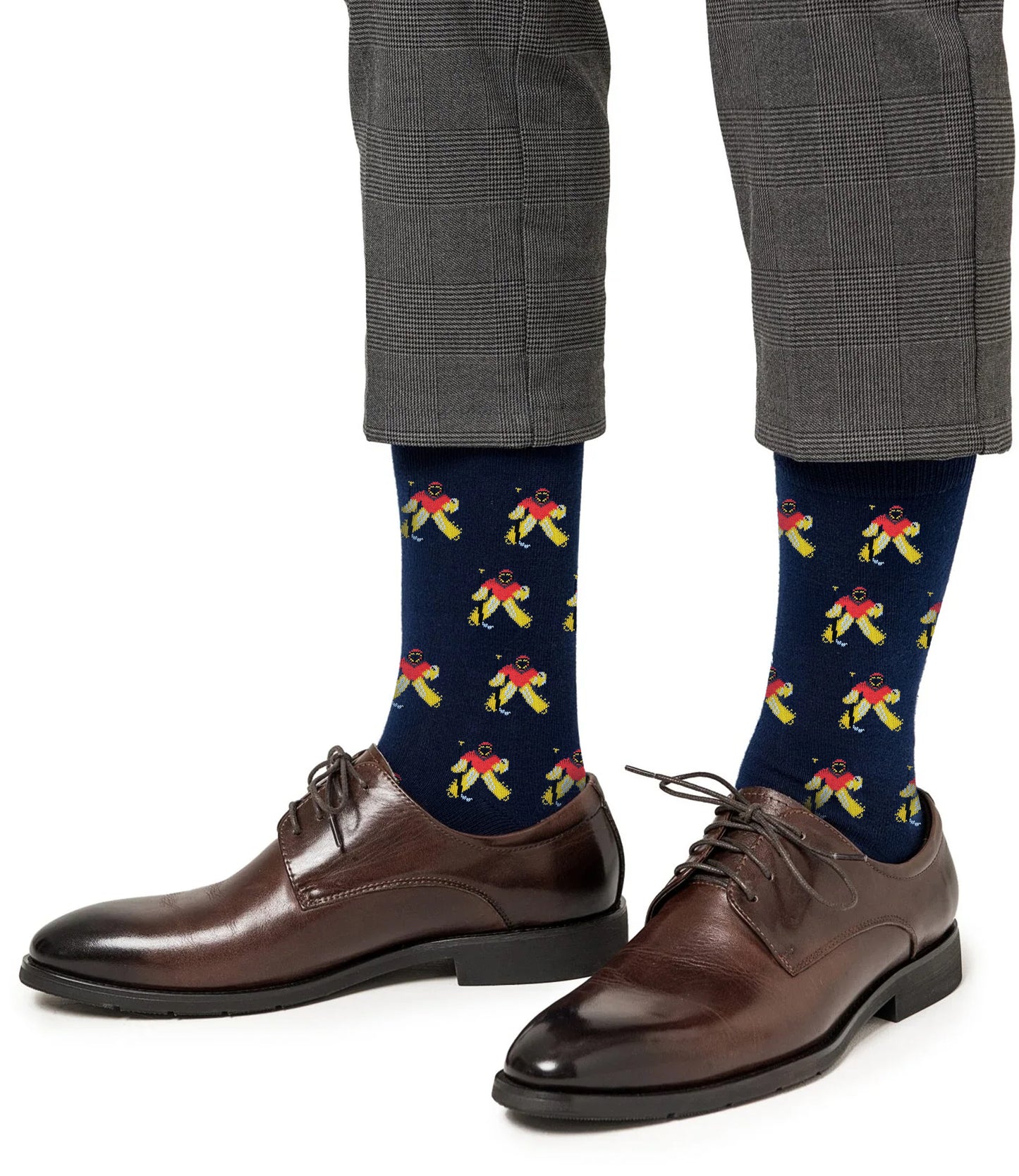 A person wearing brown dress shoes, gray plaid pants, and Ice Hockey Goalie Socks that deliver pro-level comfort and breathable durability.