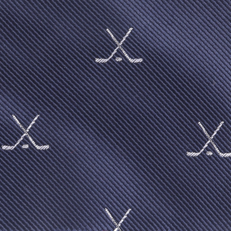 Close-up of the Ice Hockey Cross Bow Tie: dark blue fabric with diagonal stripes and small white crossed hockey sticks, adding a sporty touch—perfect as an ice hockey bow tie or unique hockey gift.