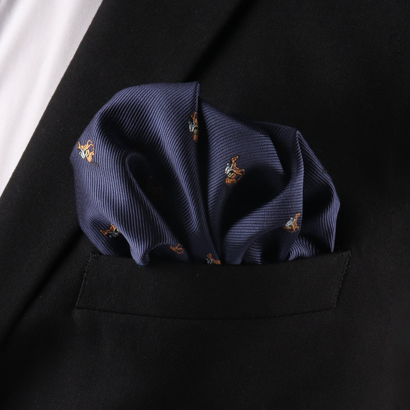 The Horse Racing Pocket Square from AusCufflinks, featuring a subtle navy blue pattern, is styled in a black suit jacket's pocket—an ideal accessory for race day or the Melbourne Cup.
