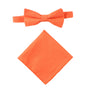 Capture spring's essence with the Peach Orange Cotton Bow Tie & Pocket Square Set, beautifully presented on a crisp white background.