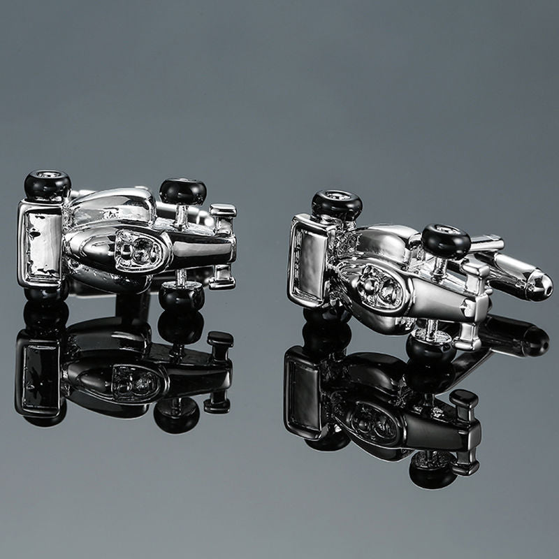 Horse Racing Cufflinks, with their silver race car design, symbolize sartorial excellence on a polished surface, reflecting speed and elegance.