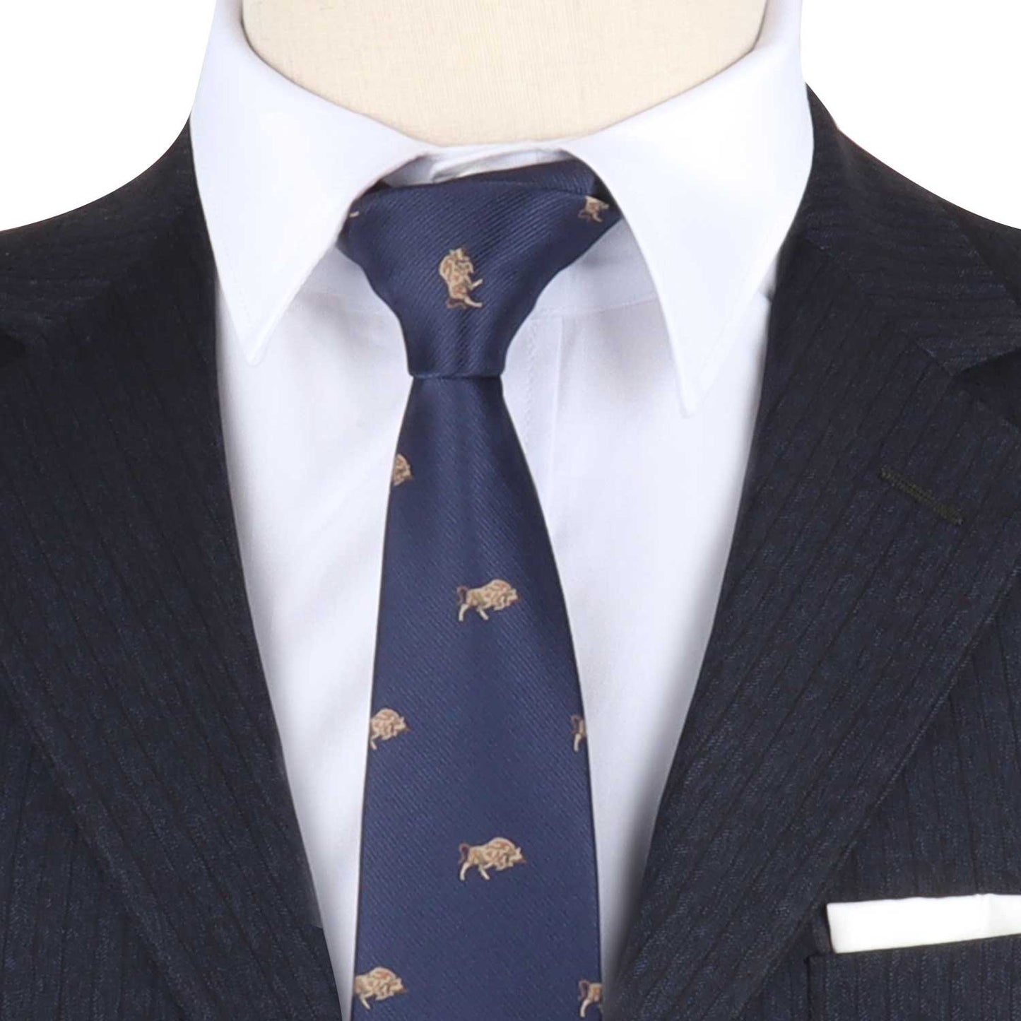 Close-up of a mannequin exuding power, dressed in a dark pinstripe suit, white shirt, and the Raging Bull Skinny Tie adorned with a small gold lion pattern.