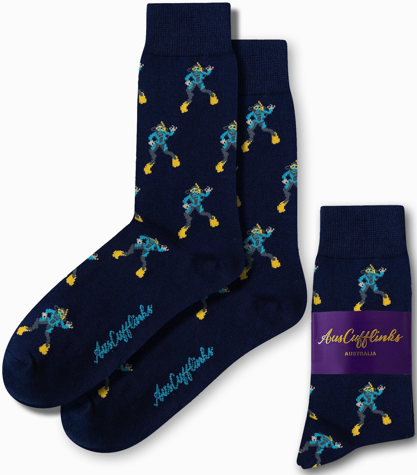 The Scuba Diver Socks are navy blue and adorned with a scuba charm, showcasing a pattern of scuba divers holding yellow fins. The side is elegantly detailed with the text "AusCufflinks Australia," enhancing their stylish appearance.