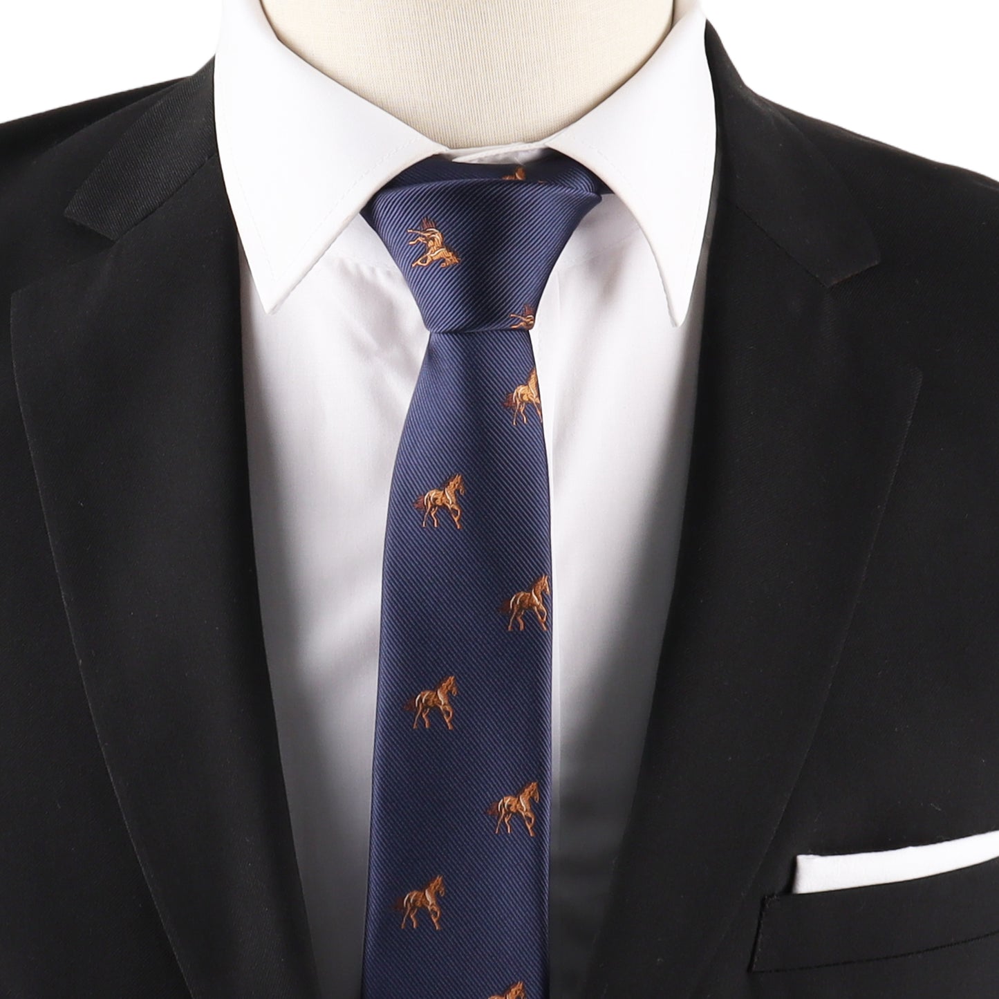A person wearing a black suit, white dress shirt, and the Stallion Horse Skinny Tie featuring a brown horse pattern on navy blue.