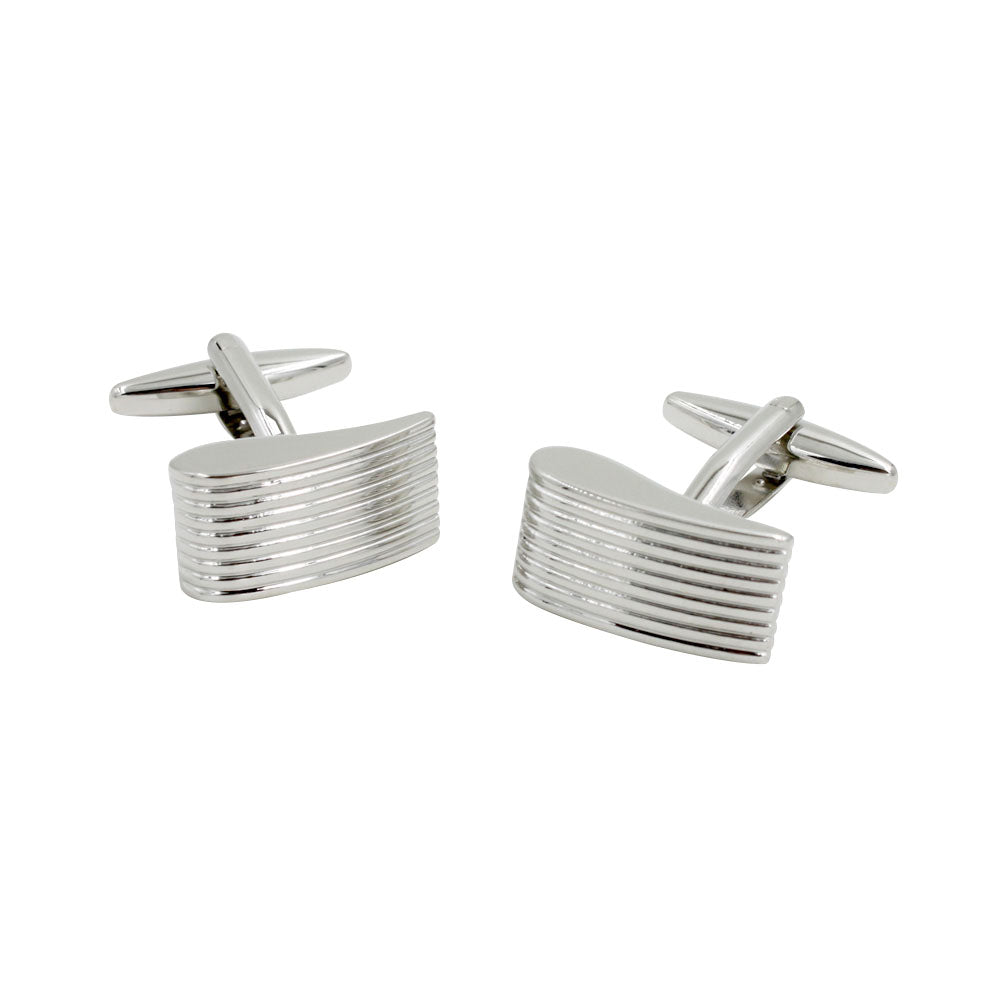The Horizontal Sweep Cufflinks are a pair of silver cufflinks exhibiting linear elegance with a grooved, rectangular design on their faces, complemented by a bullet back closure.