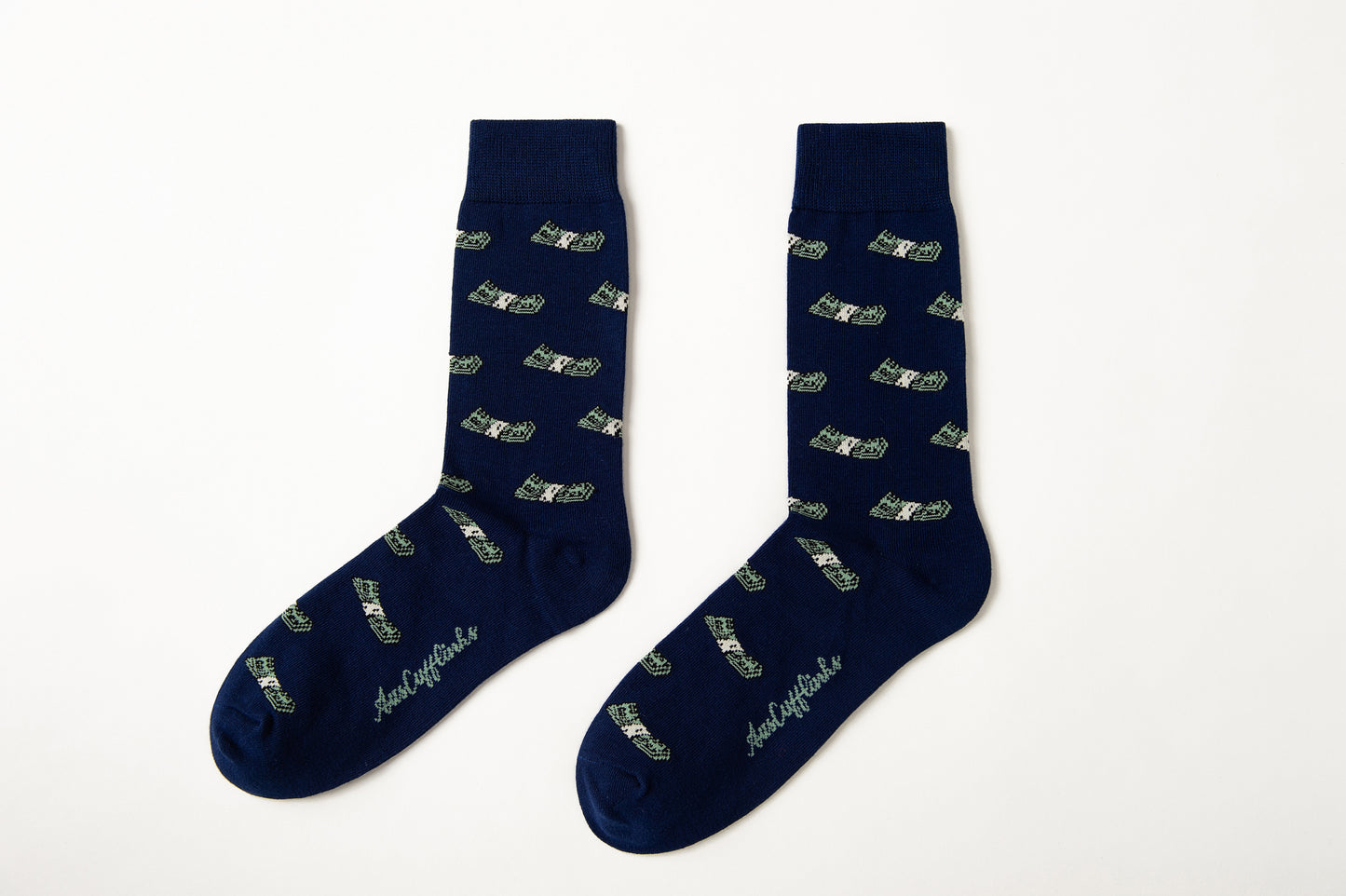 Fun novelty socks for men featuring dollar bill pattern on navy background