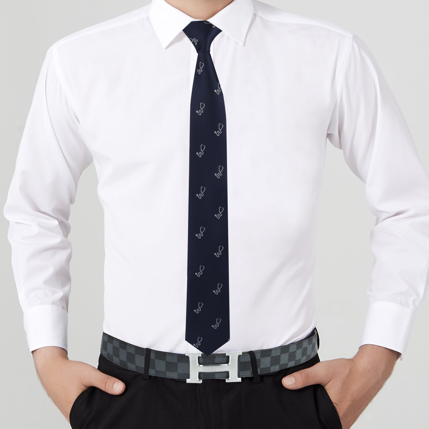 A man wearing an extraordinary Stethoscope Skinny Tie and white shirt.