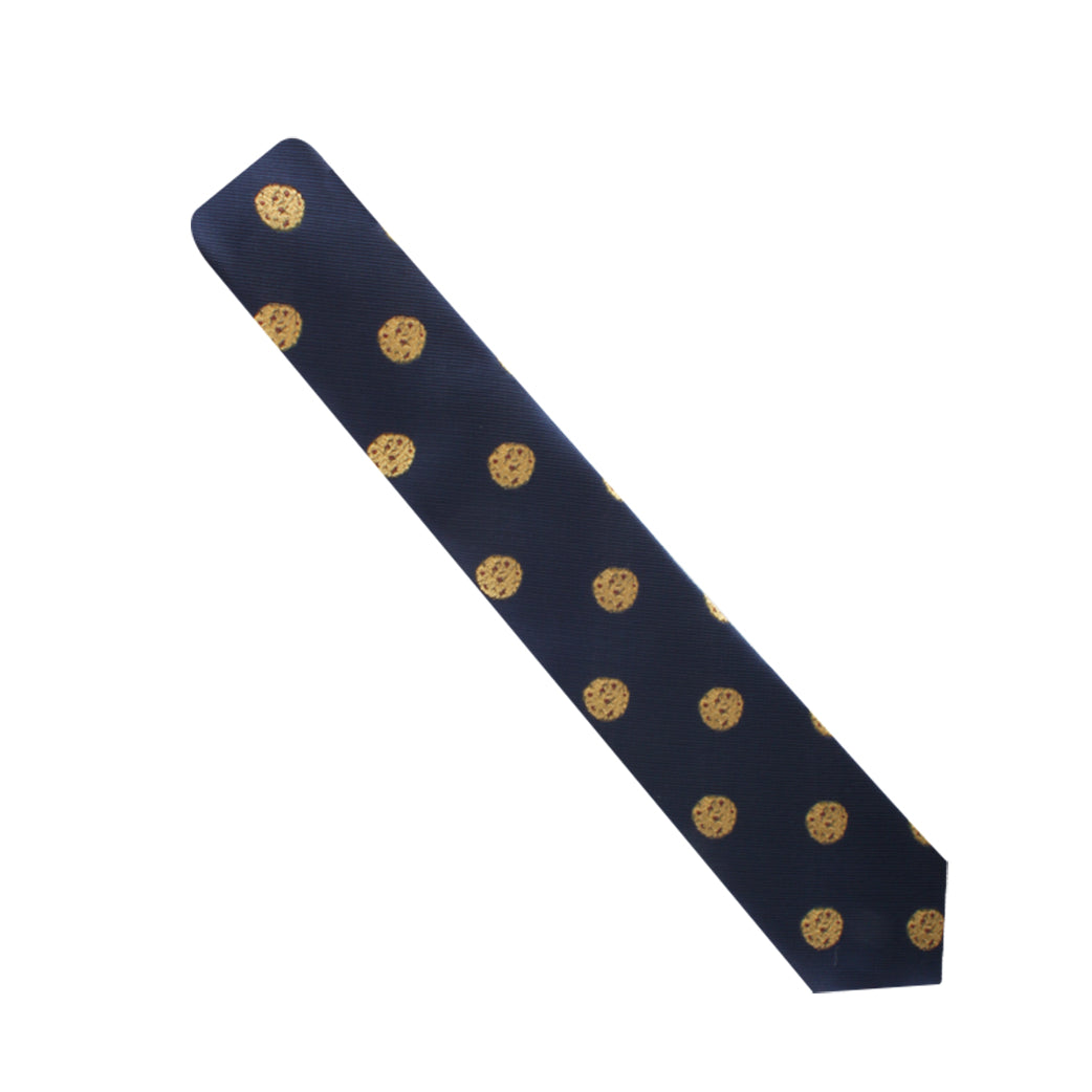 A Cookies Skinny Tie with gold dots on it, adding a touch of sweetness to your timeless style.