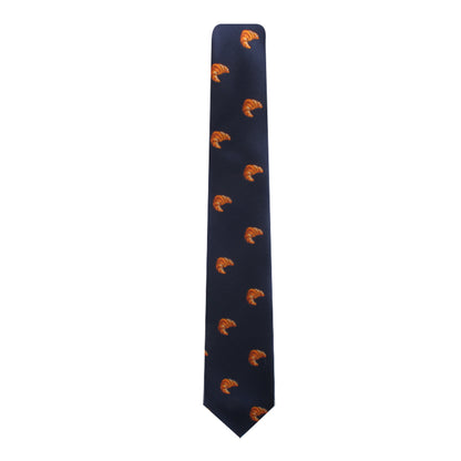 A Croissant Skinny Tie with an orange owl on it, adding a touch of style.