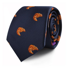 A Croissant Skinny Tie with stylish orange croissants on it.