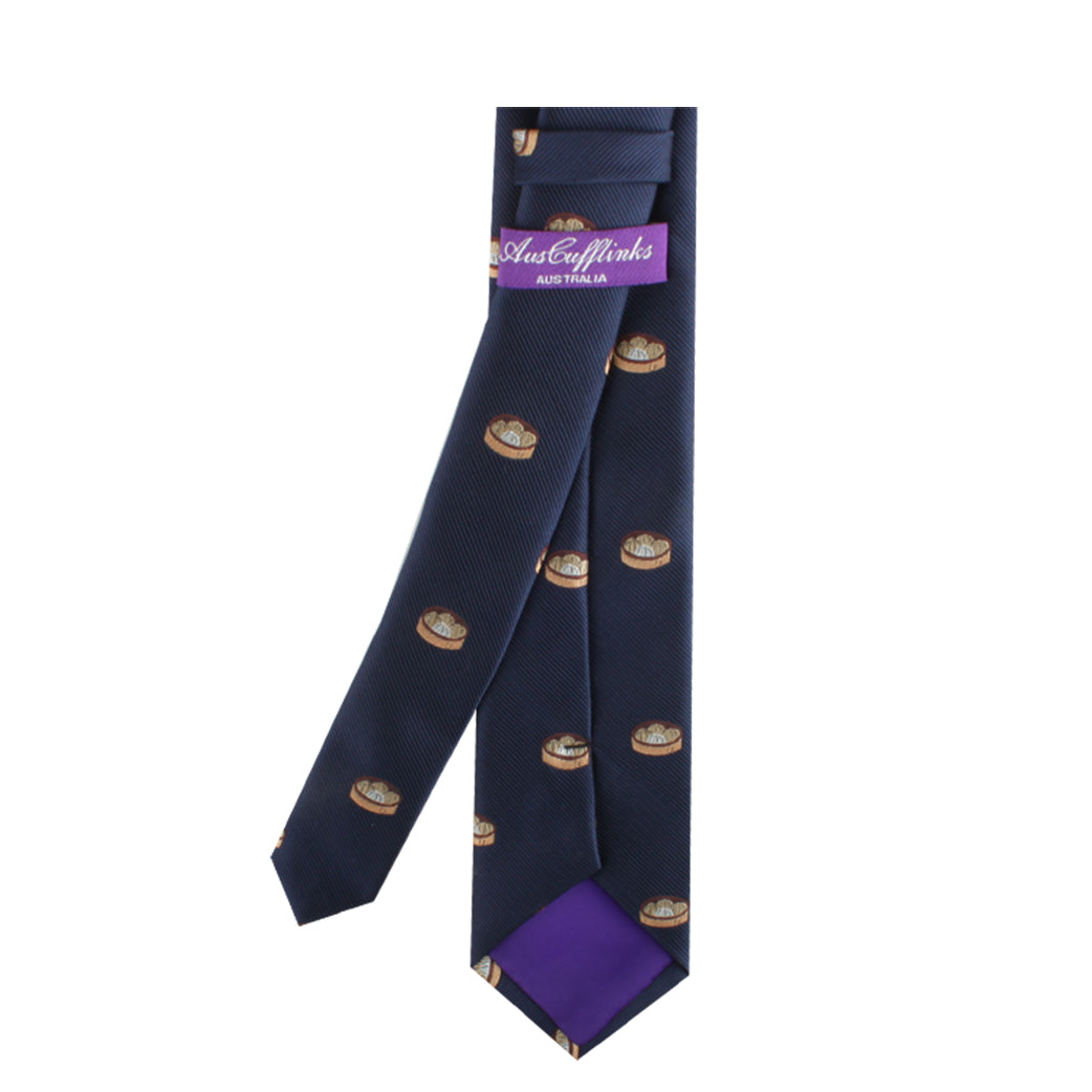 A Dumplings Skinny Tie with a purple label and small donut patterns throughout, exuding timeless elegance with a touch of culinary inspiration.