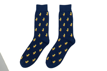 A pair of blue Duck Socks with yellow ducks on them.