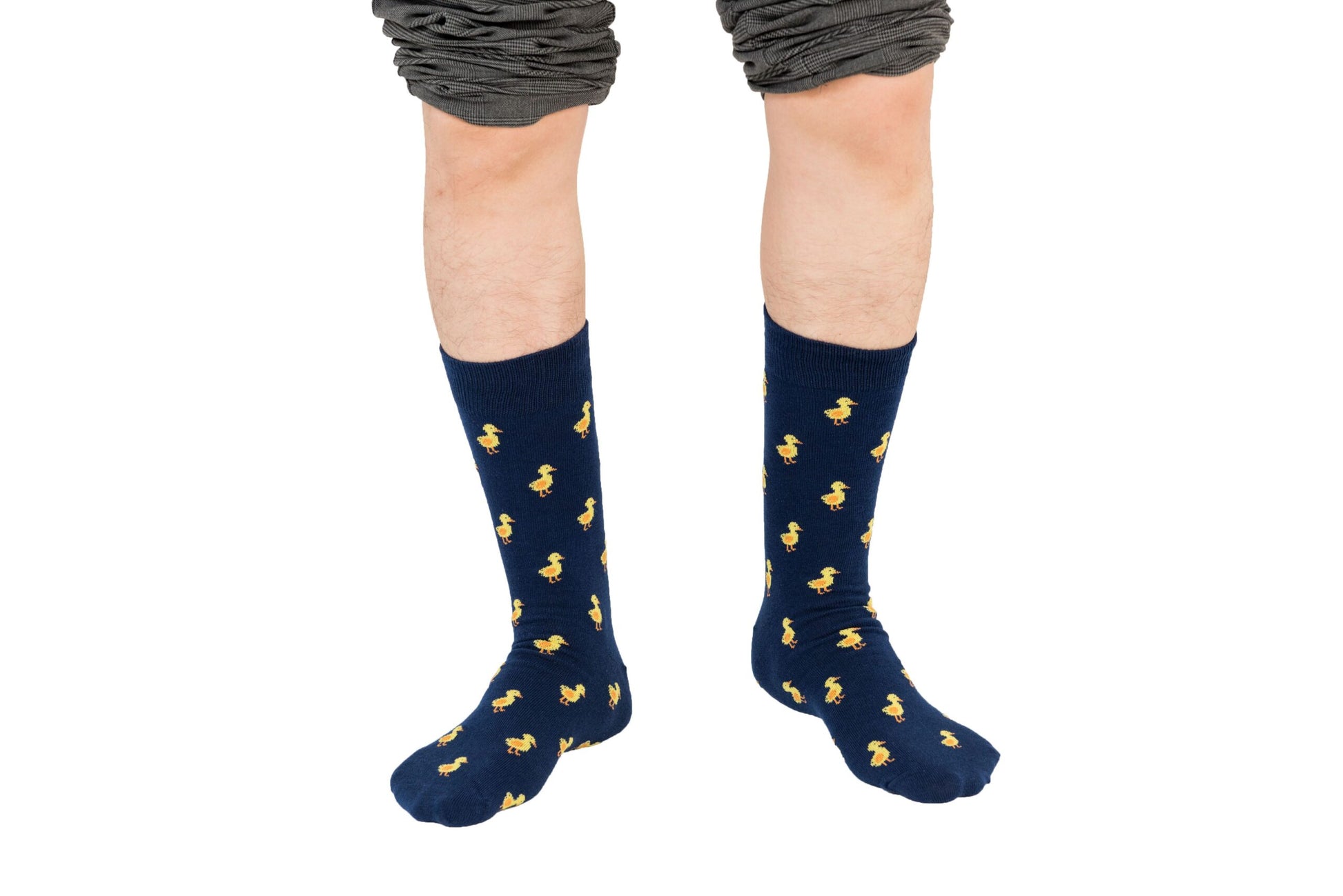 A boy wearing a pair of Duck Socks.
