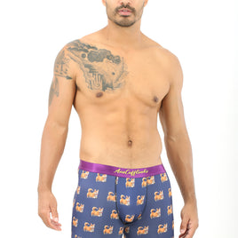 A man with tattoos wearing Corgi Dog Underwear.