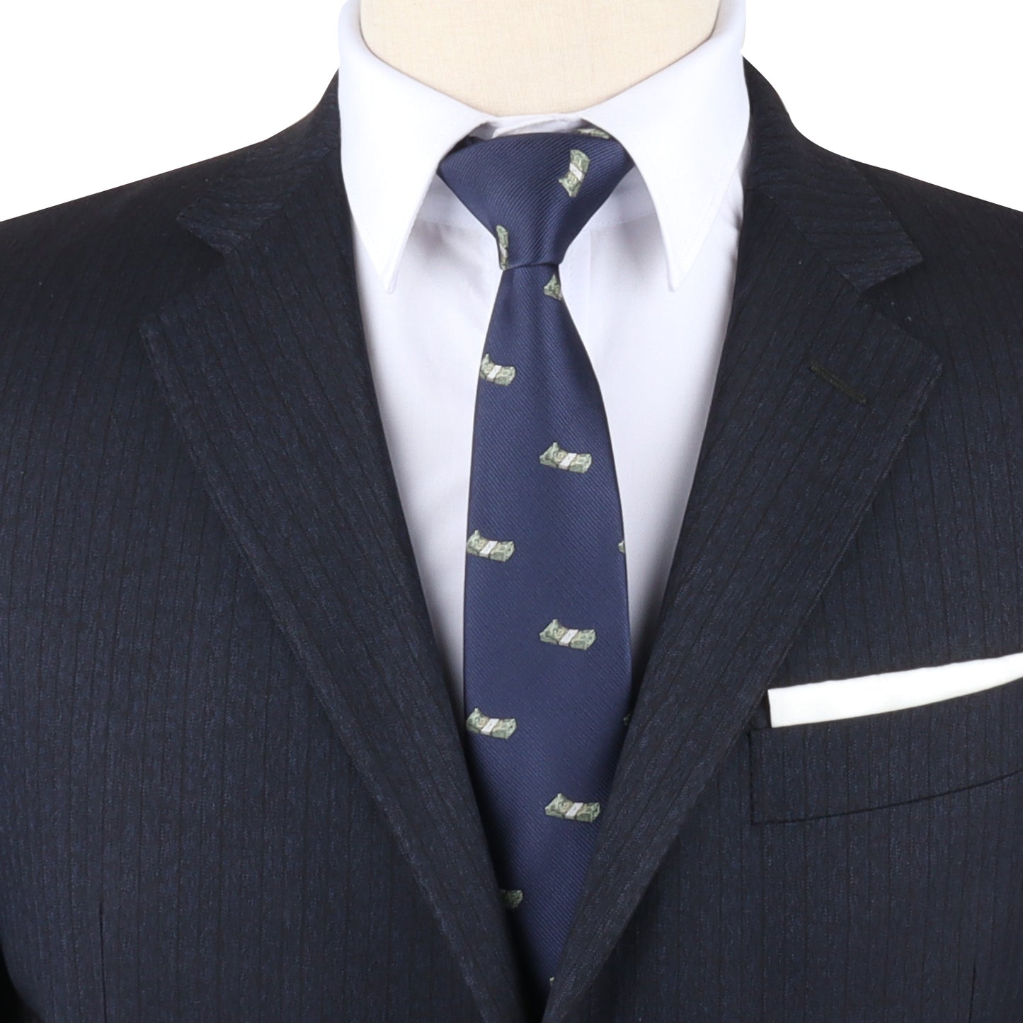 A mannequin showcasing an affluent look in a Cash Skinny Tie suit and tie.