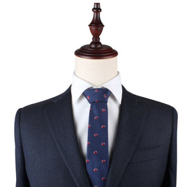 A headless mannequin dressed in a dark pinstripe suit with a white shirt and a Gridiron Skinny Tie exudes timeless charm.