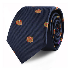 Navy blue morning delight tie with burger motif, rolled up. 
Pancakes Skinny Tie with burger motif, rolled up.