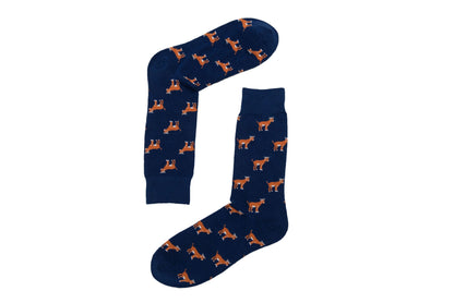 A pair of Goat Socks with orange and white dogs on them.