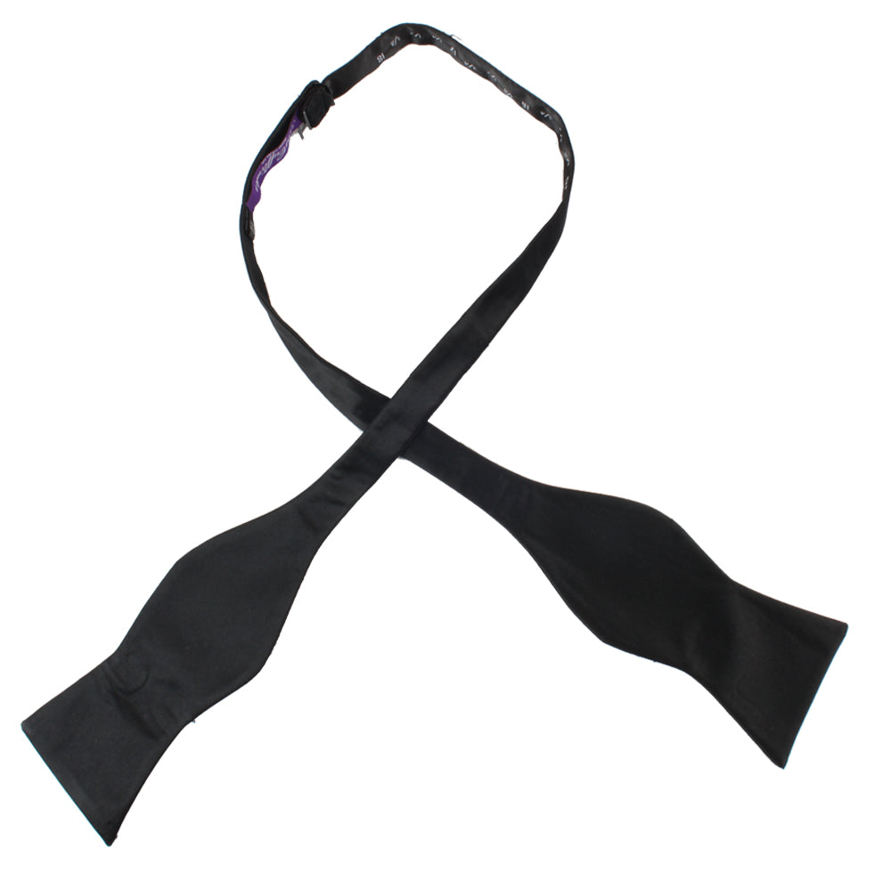 A classic Black Cotton Self Tie Bow Tie on a white background.
