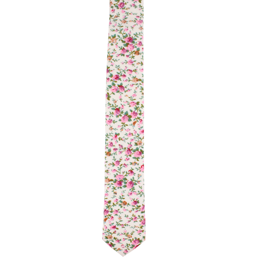 A cream floral skinny tie on a blossoming style background.