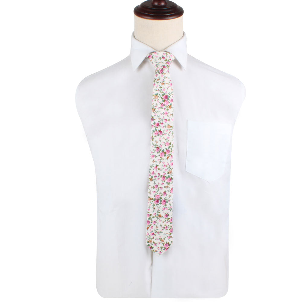 A mannequin wearing a white shirt and Cream Floral Skinny Tie, showcasing blossoming style.