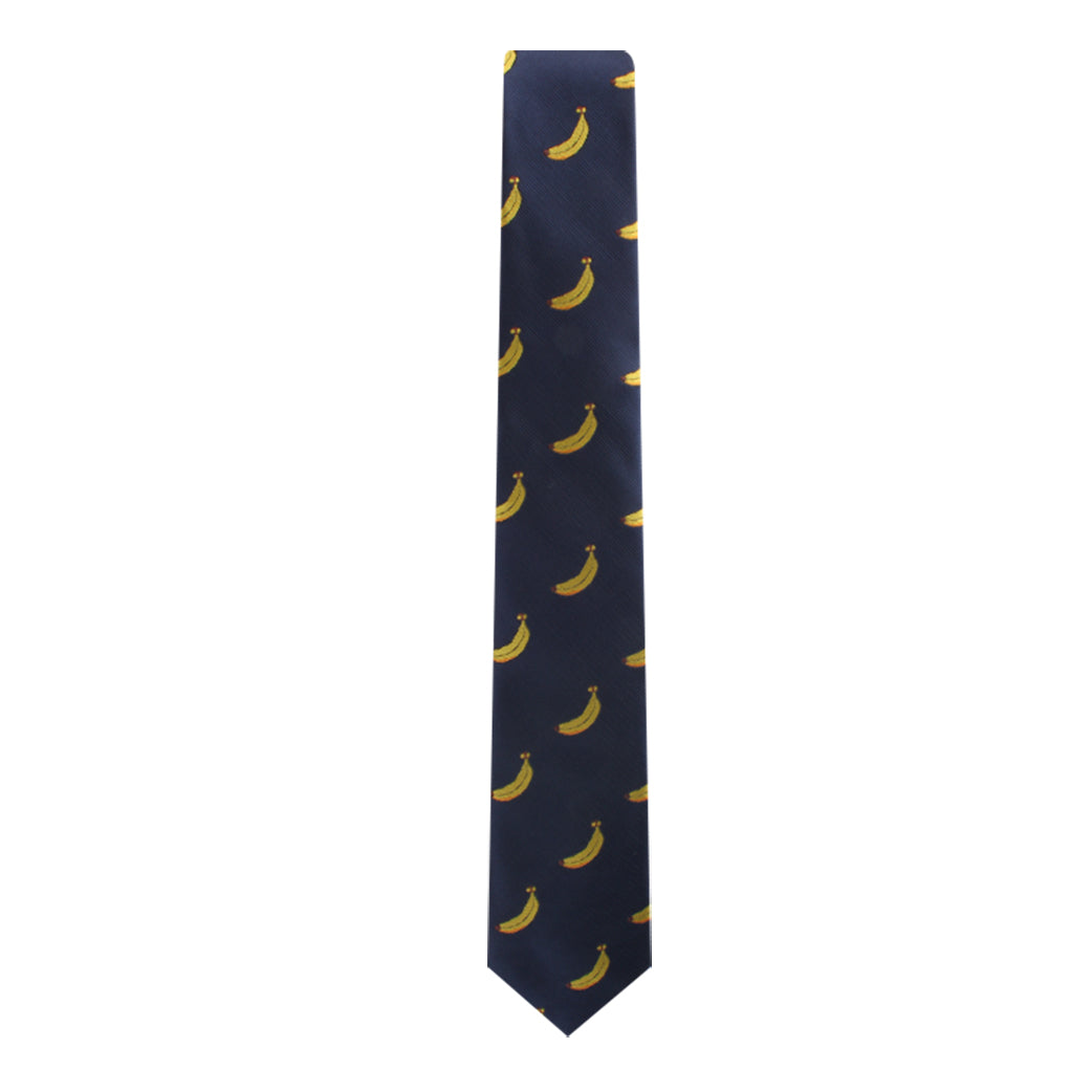 A dark blue Banana Skinny Tie with a pattern of tropical yellow bananas, embodying modern elegance.