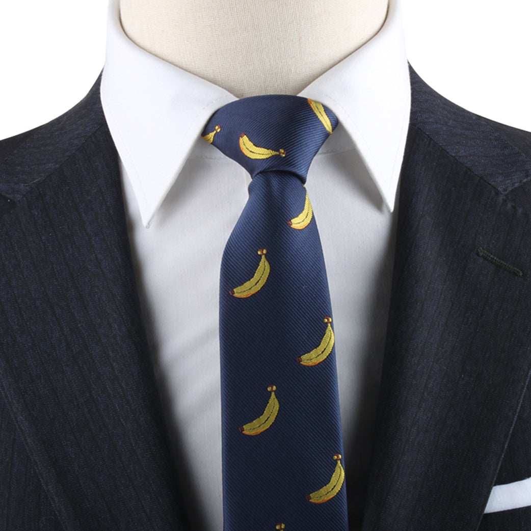 A Banana Skinny Tie with bananas on it is on a mannequin.