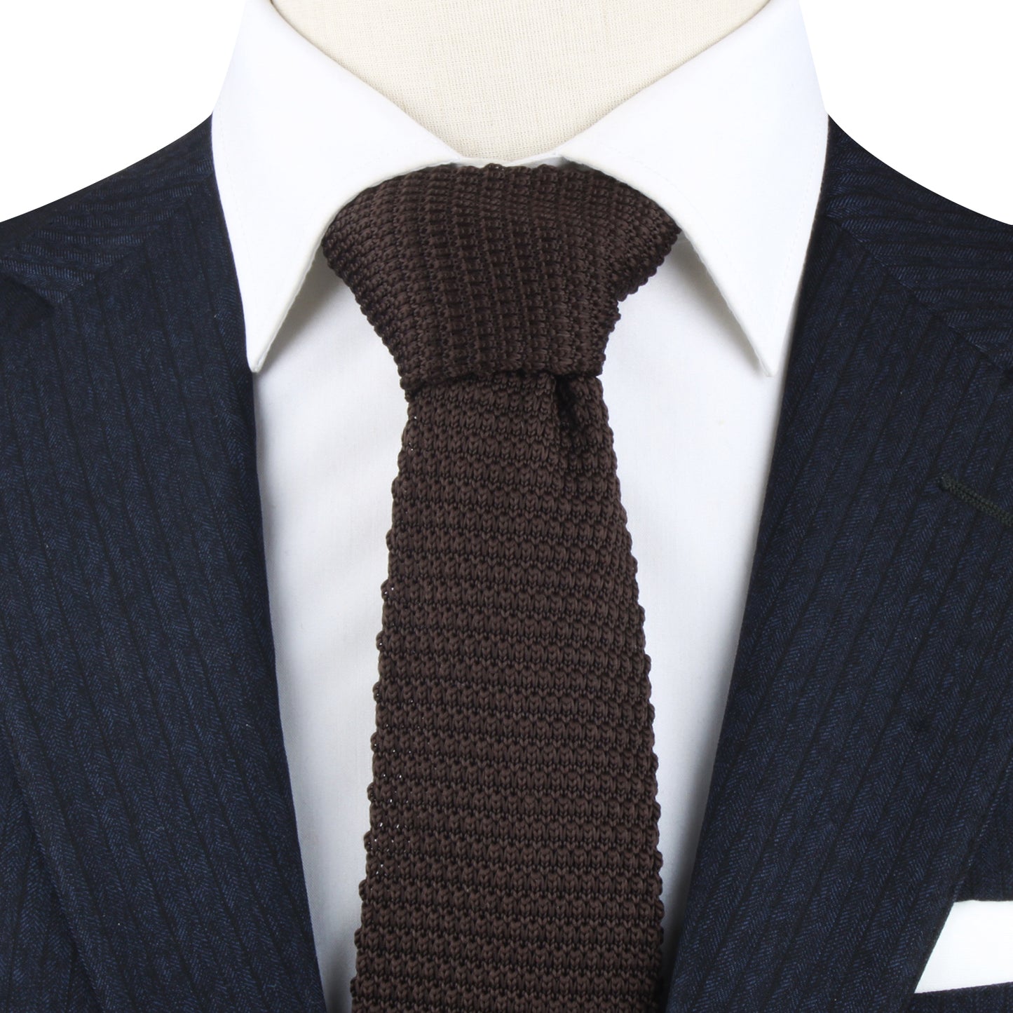 A Brown Knitted Skinny Tie on a mannequin, exuding earthy vibes.