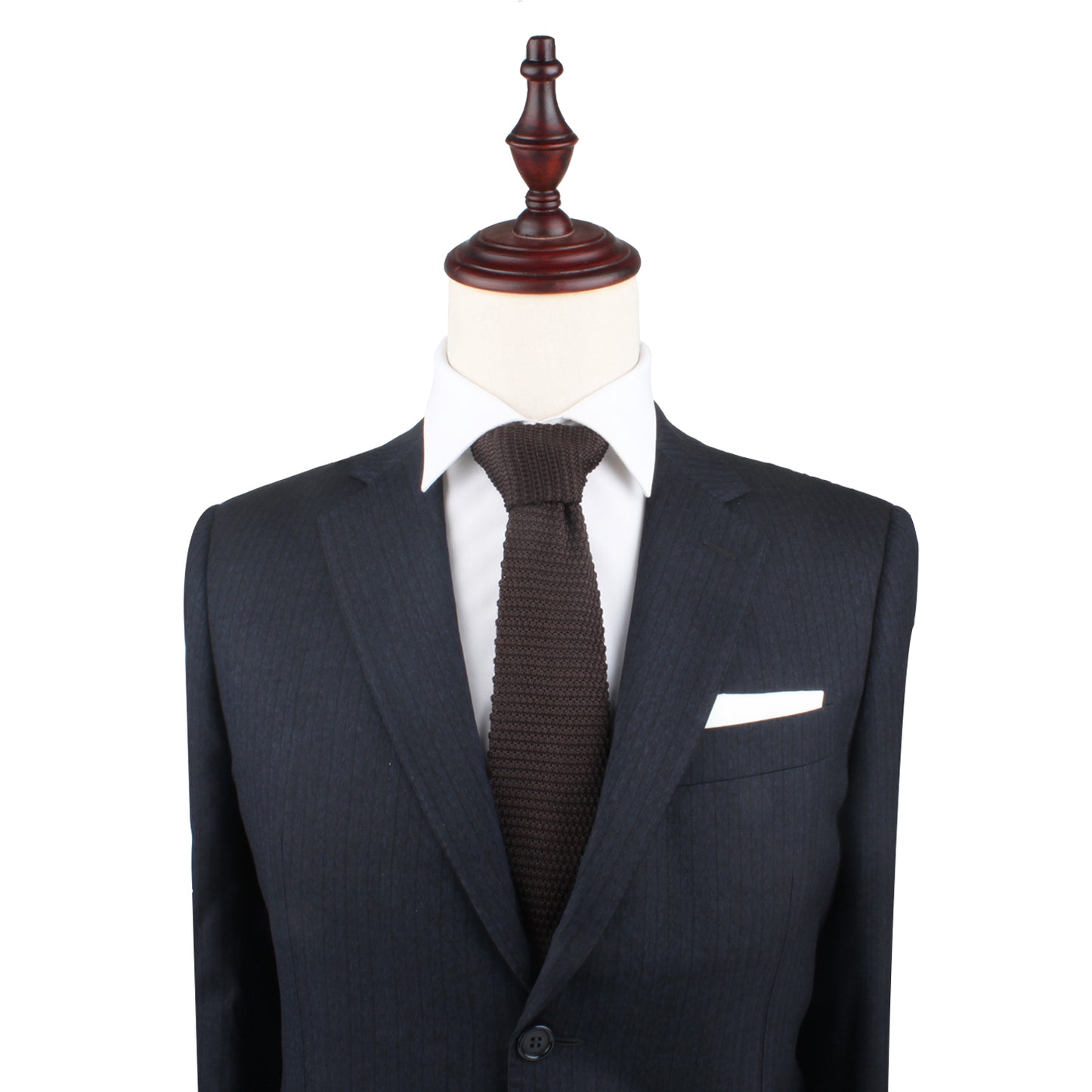 A Brown Knitted Skinny Tie on a mannequin.