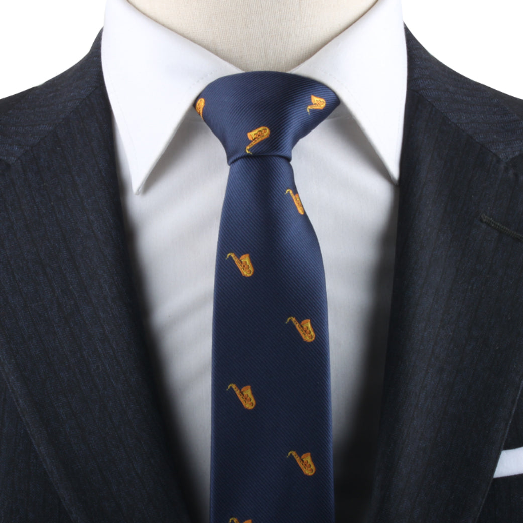 Mannequin dressed in a suit with a Saxophone Skinny Tie featuring yellow bear patterns, embodying musical elegance in its design.