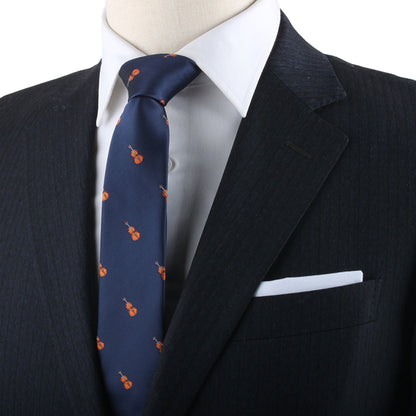 A melodic fashion tribute featuring a mannequin wearing a blue suit with a Violin Skinny Tie.