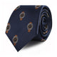 A rolled-up navy blue Watch Skinny Tie with a pattern of stylized, timeless elegance watch designs on a white background.