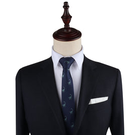 A black suit with a Brontosaurus Skinny Tie on a mannequin dummy that exudes dino elegance.
