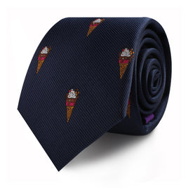 A navy blue silk tie rolled up, patterned with colorful Ice Cream Skinny Tie designs that add a touch of sweetness to its style.