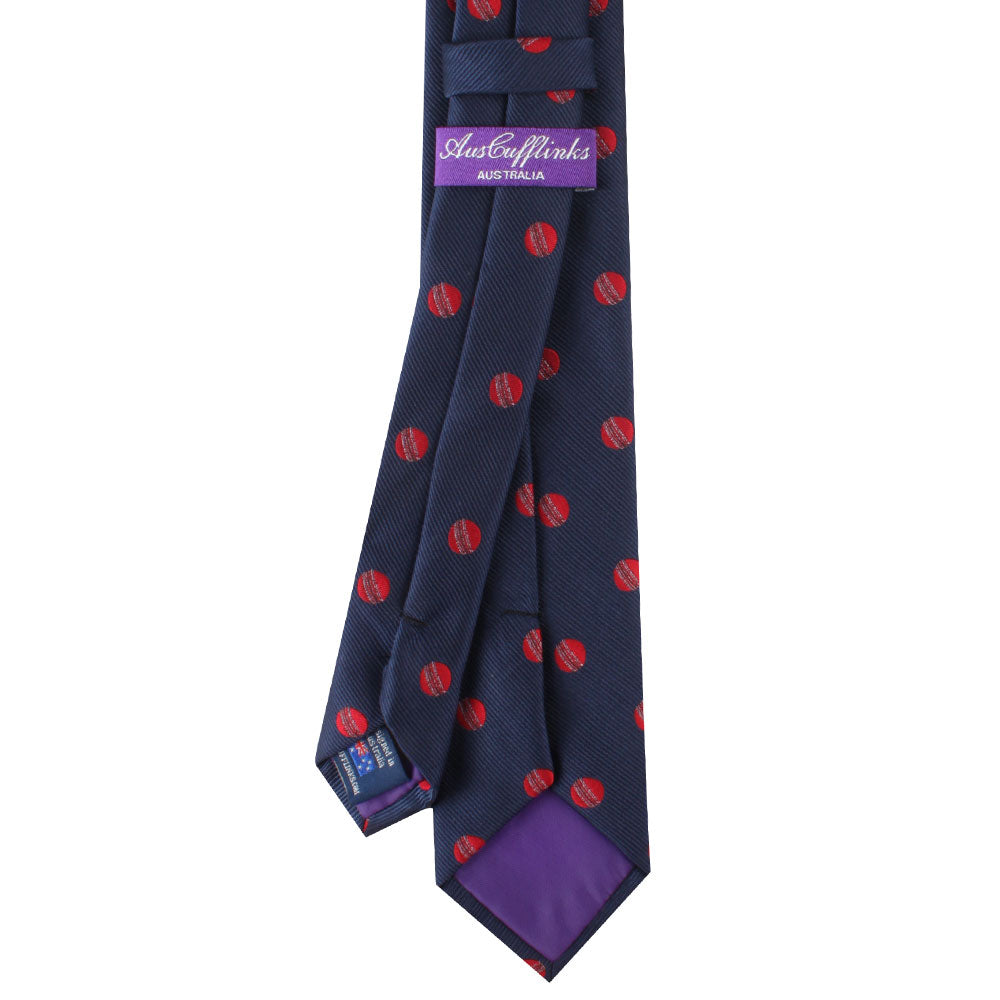 A Cricket Skinny Tie with cricket-inspired red and blue polka dots.