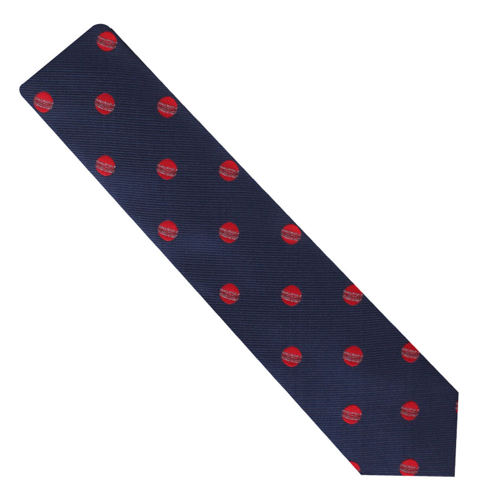 A Cricket Skinny Tie with red and blue circles on it, perfect for cricket enthusiasts.