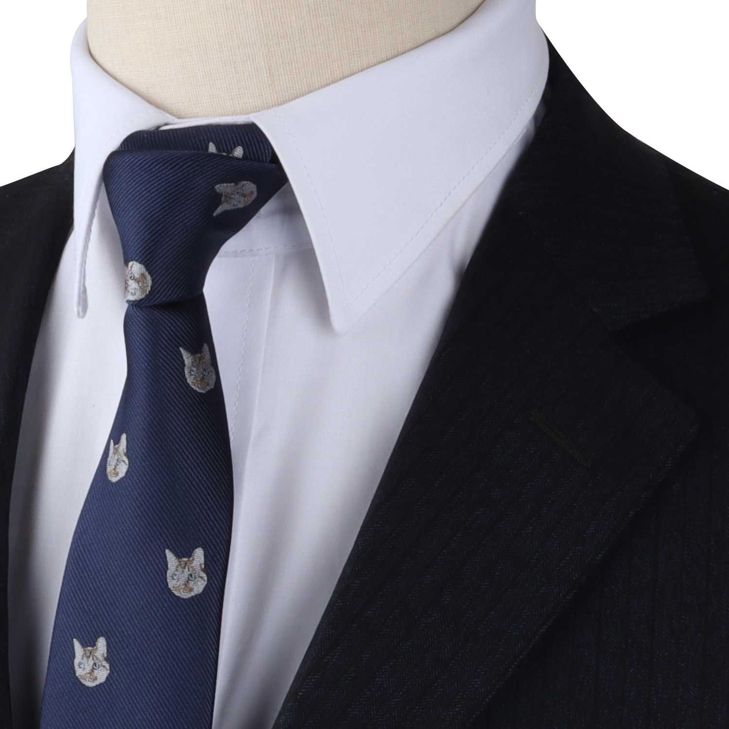 A mannequin wearing a Cat Skinny Tie blue suit and tie.