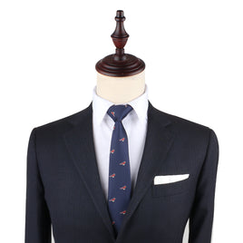 A mannequin wearing a suit and Cardinal Bird Skinny Tie exudes vivid elegance.