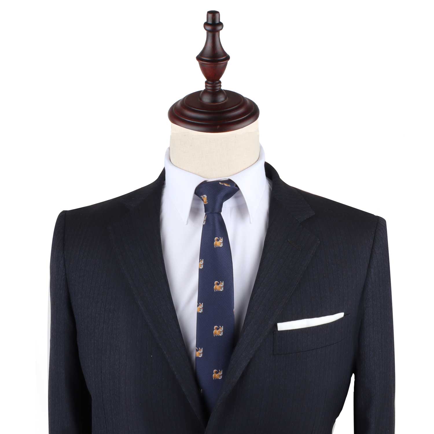 A mannequin displaying a Corgi Dog Skinny Tie with charm.