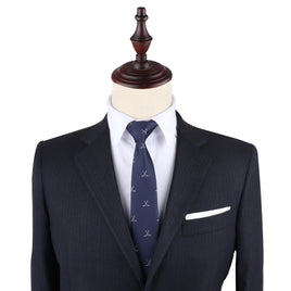 A mannequin dummy dressed impeccably in a suit and tie, earning style points for its Crossed Ice Hockey Skinny Tie.