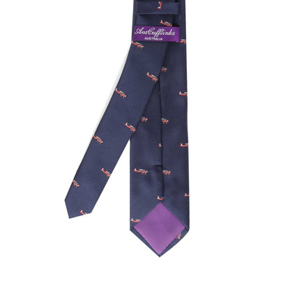 A Classic Aircraft Skinny Tie with a purple and blue design on it.