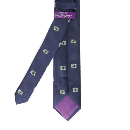 A Camera Skinny Tie with a purple and blue design that will capture attention.