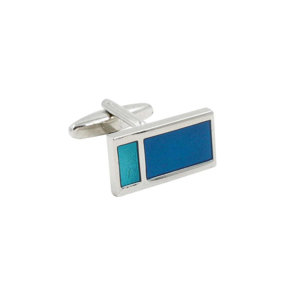 Aqua Rectangle Cufflinks: Silver rectangular cufflink with a geometric design, showcasing two blue enamel sections—a smaller teal rectangle on the left and a larger deep blue rectangle on the right—capturing an oceanic elegance that epitomizes refined style.