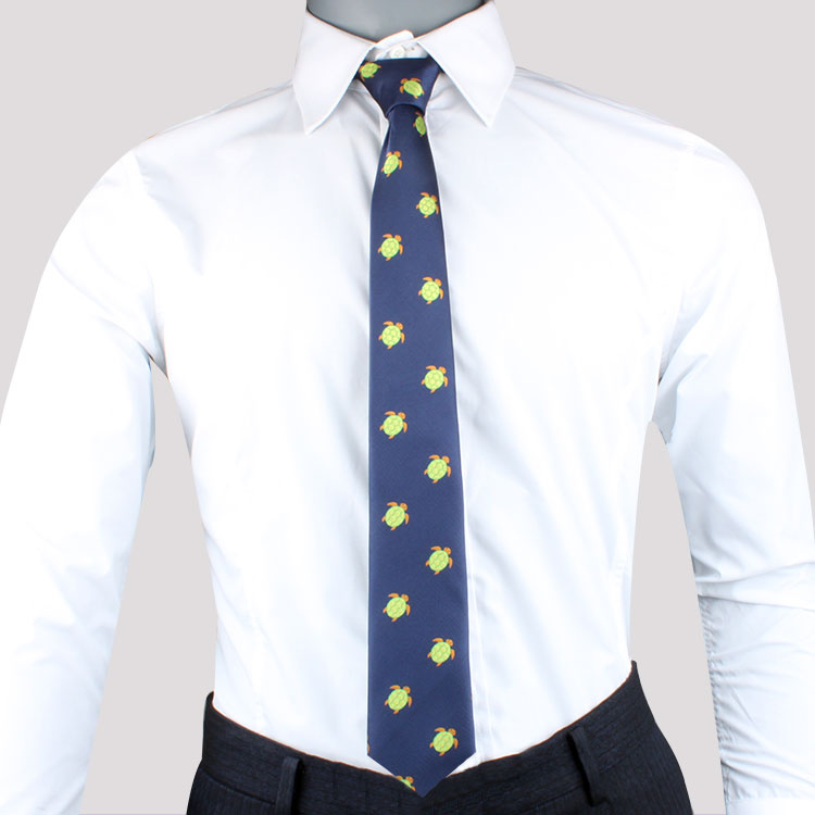A mannequin wearing a white dress shirt and Aquatic Themed Necktie with yellow floral patterns, exemplifying modern style.