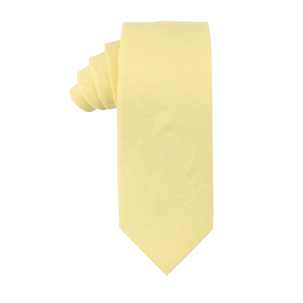 A Baby Yellow Cotton Skinny Tie & Pocket Square Set on a white background.