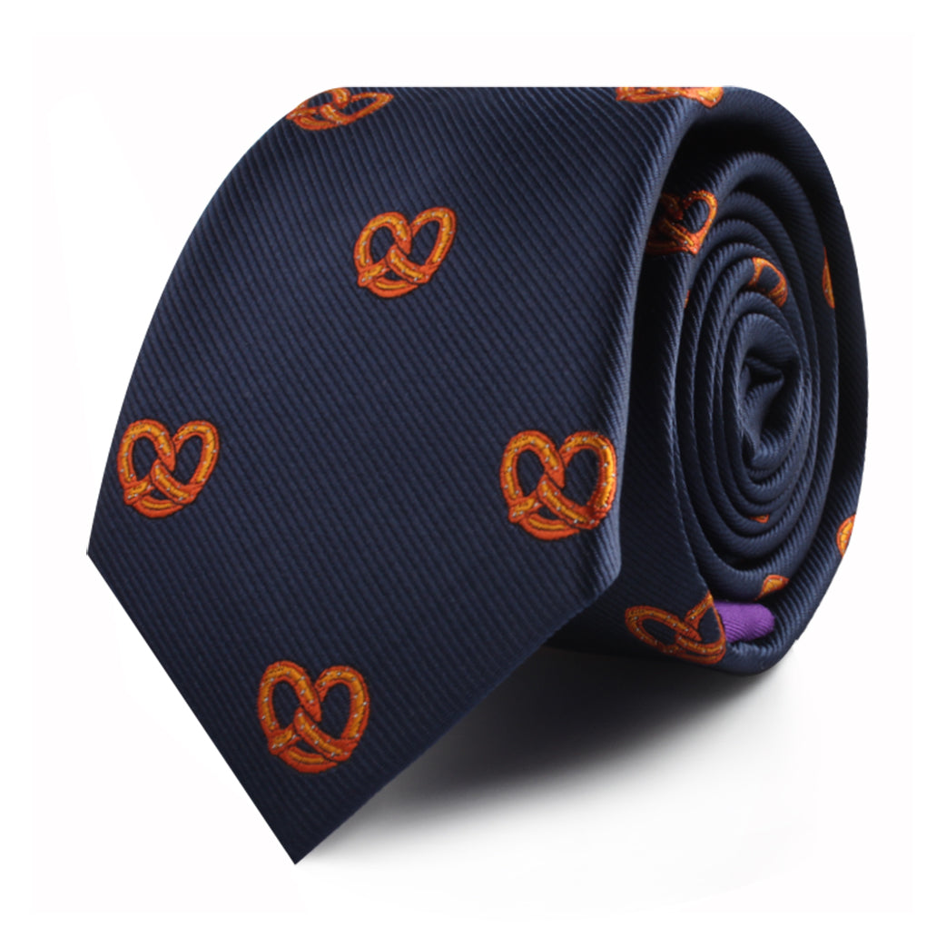 A Bagel Skinny Tie adorned with an orange pretzel pattern, adding a touch of culinary delight to your contemporary style.