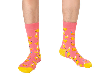 A man wearing Banana Pink Socks.