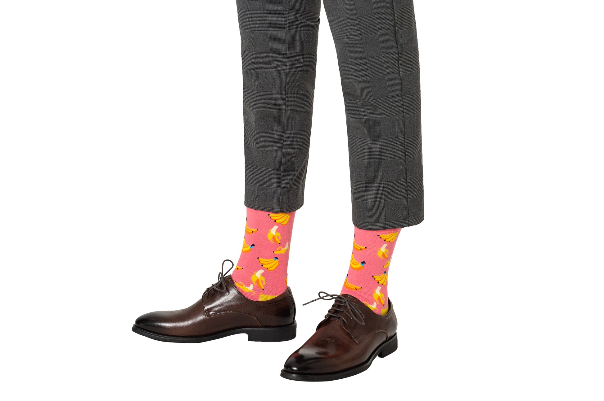 A man wearing a pair of Banana Pink Socks.